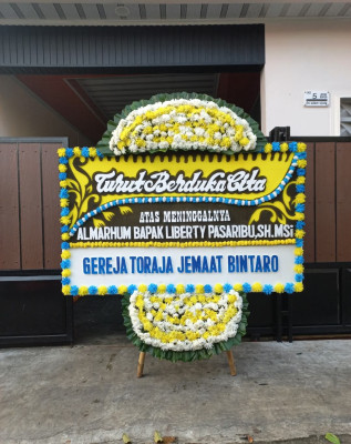 Papan Bunga Duka di Irimuli